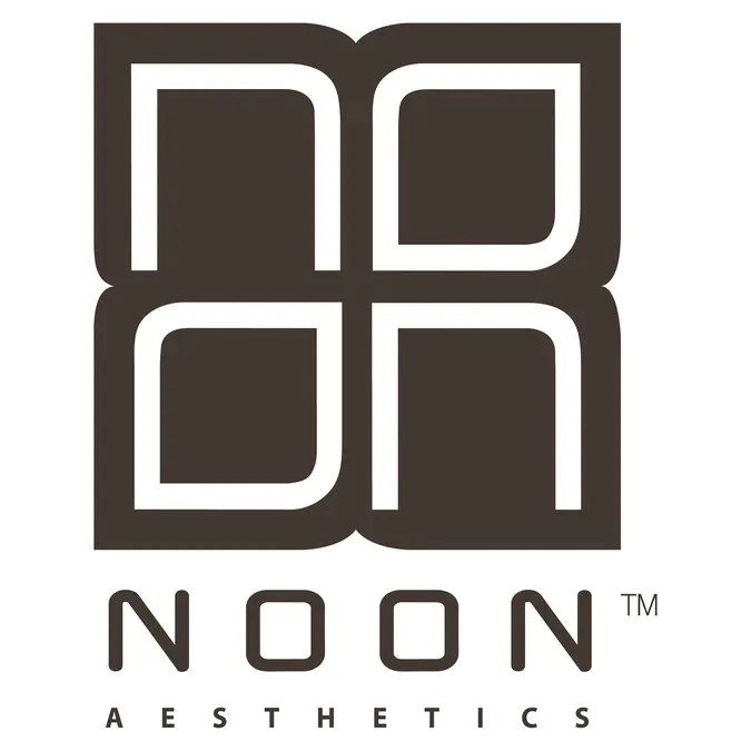 A brown and white logo of noon aesthetics